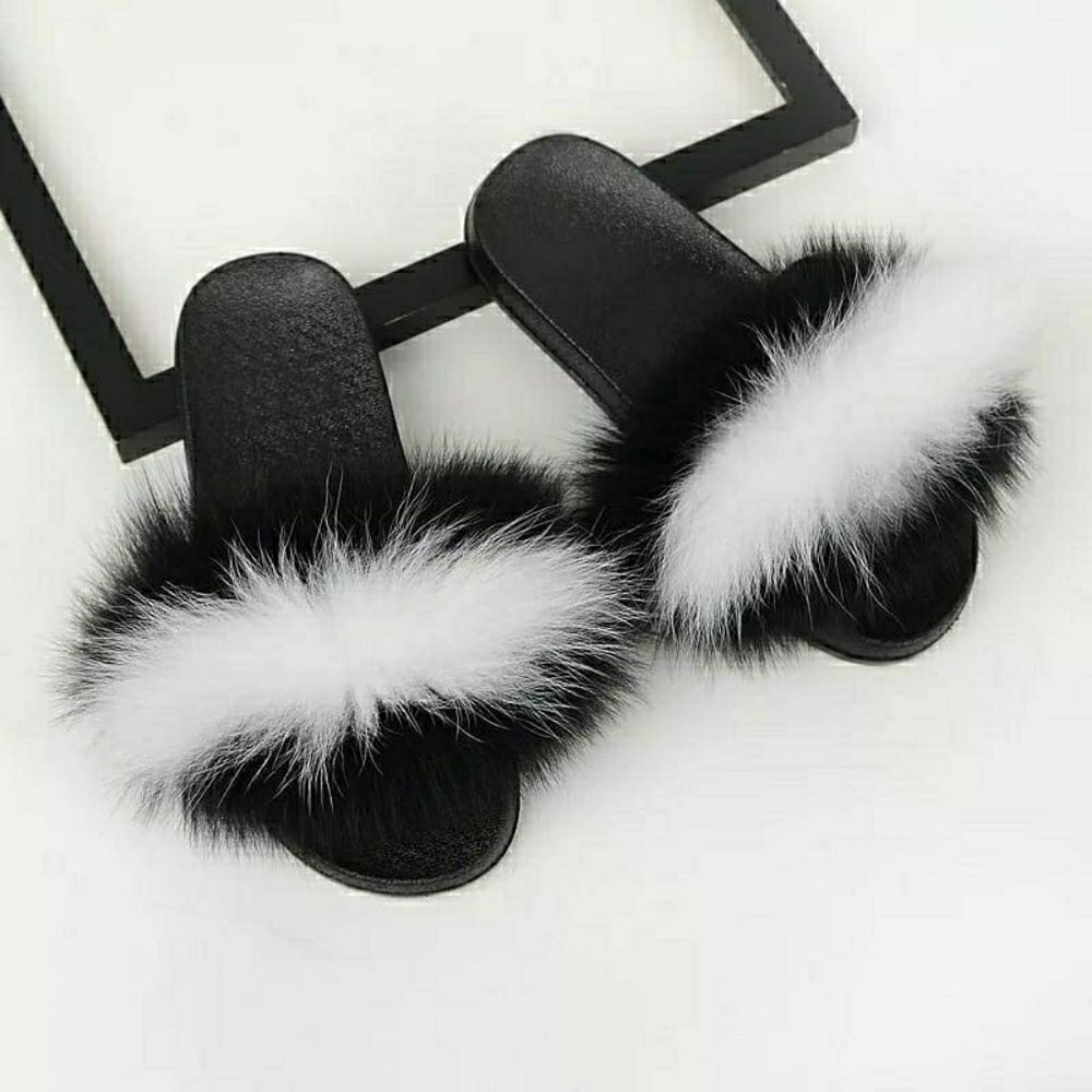 Black and white fox fur slides